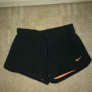 dri-fit dark grey and orange nike shorts
